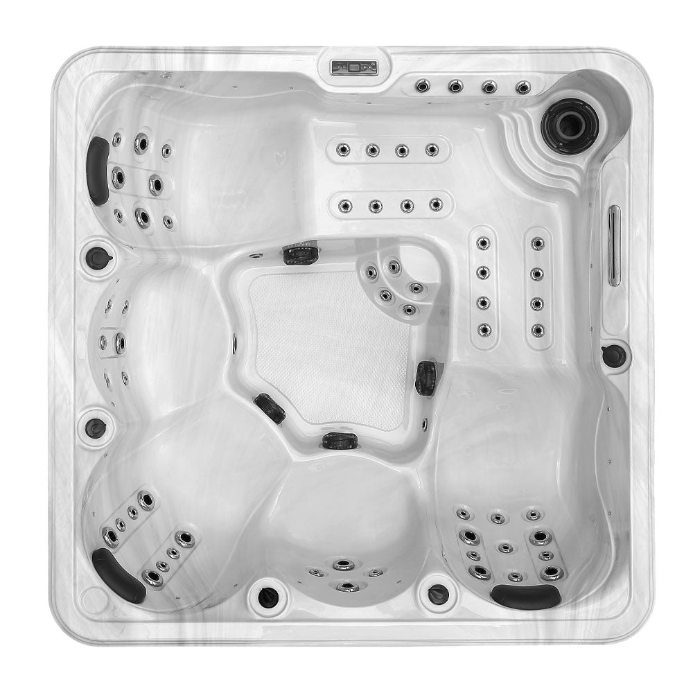 White hot tub with black jets and a control panel.