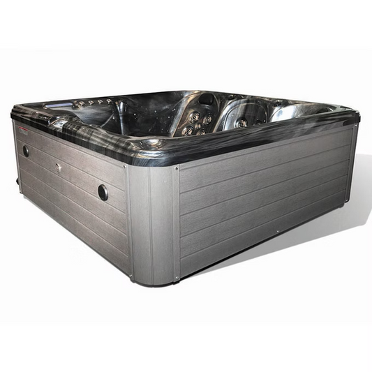 Gray rectangular hot tub with a sleek, modern design and black marble-like interior.