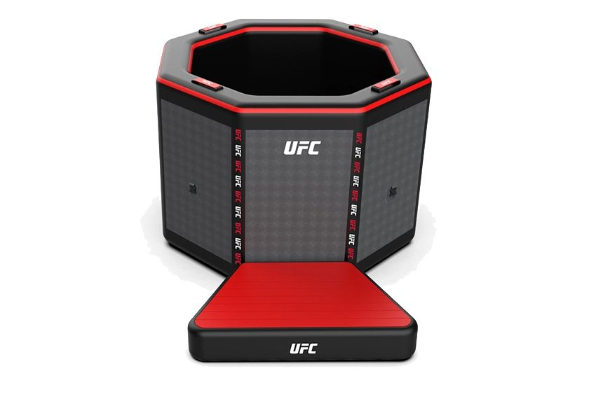 Black and red octagonal ufc training pad with a matching red base.