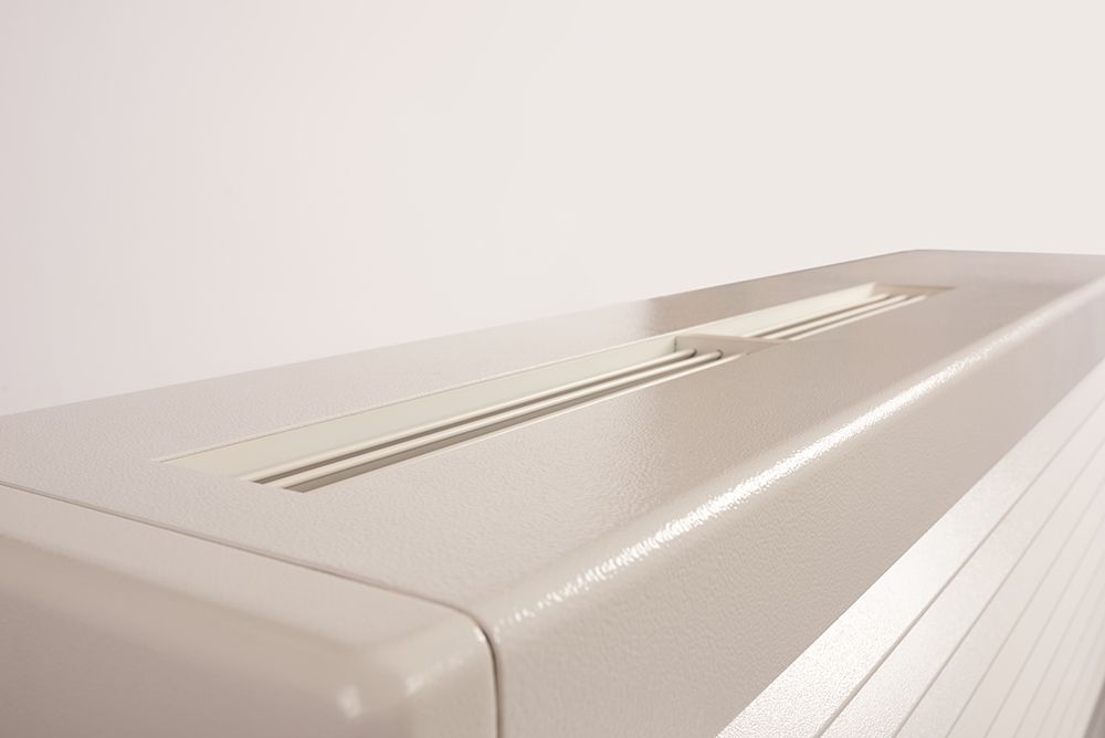 Beige plastic air vent with two parallel slotted openings.