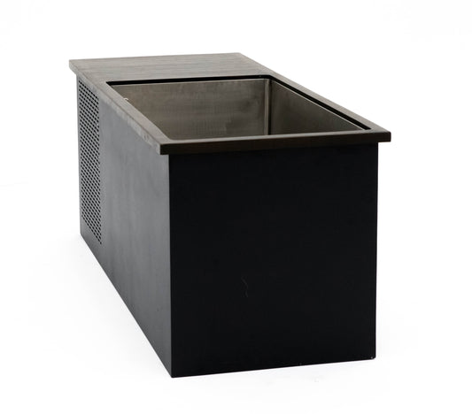 Black rectangular undercounter ice maker with a stainless steel interior and perforated side panel.