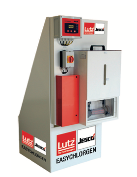 Gray and red industrial machine with digital display, branded ’lutz jesci’ on its side.