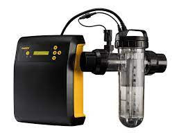 Black and yellow water filtration system with transparent cylindrical filter housing
