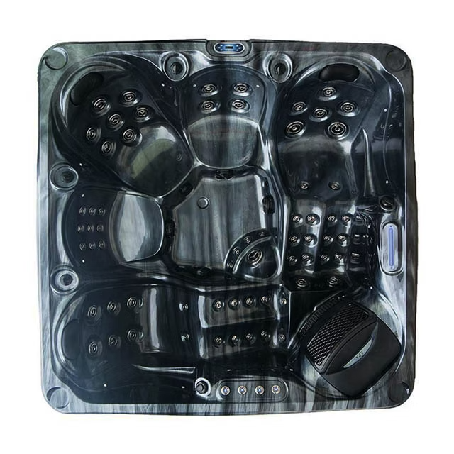 Black and gray marbled hot tub with multiple seating areas, jet nozzles, and a control panel.