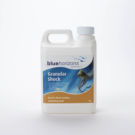 White plastic jug with a handle and white cap, labeled ’bluehorizons granular shock’ for shock treating swimming pools.