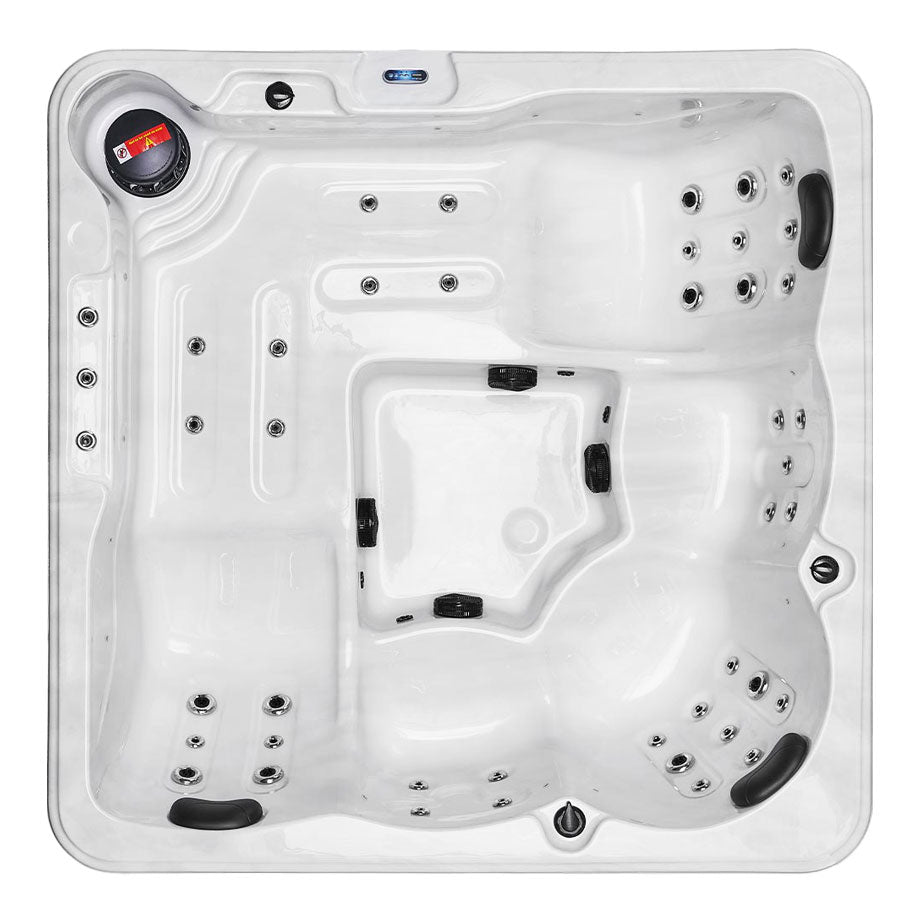 White rectangular hot tub with black and silver jets, handles, and control panel.