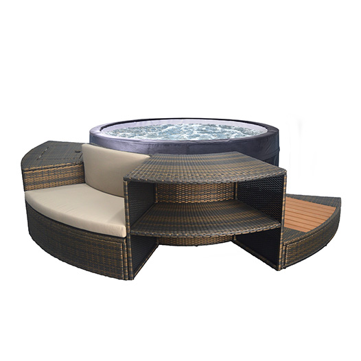 Dark brown wicker patio set with beige cushions and a built-in circular hot tub.