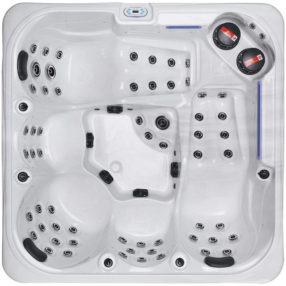 White hot tub with black jets and control panel.