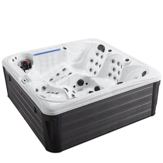 White and black hot tub with multiple jet nozzles and a control panel.