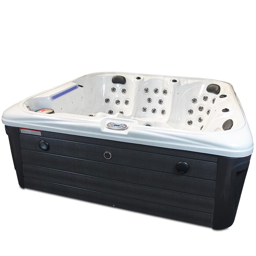 White and black hot tub with multiple jet nozzles, a control panel on the side, and a sleek modern design.