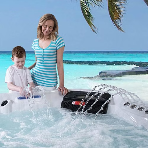 Black rectangular hot tub cover with red and white branding on the side