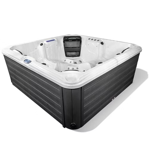 Black and white corner hot tub with a mesh backrest.