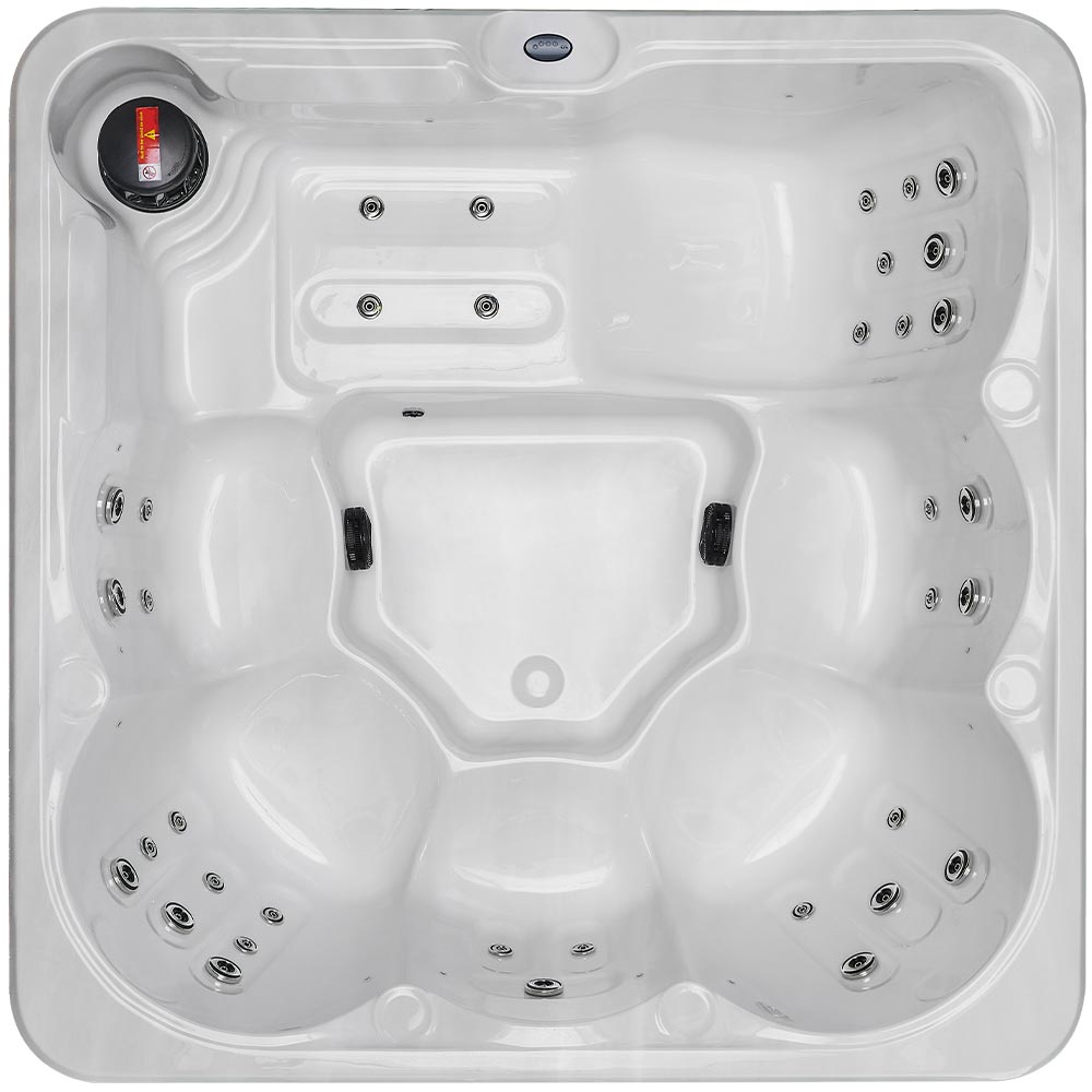 White hot tub with multiple jet nozzles and a black circular cover on one side.