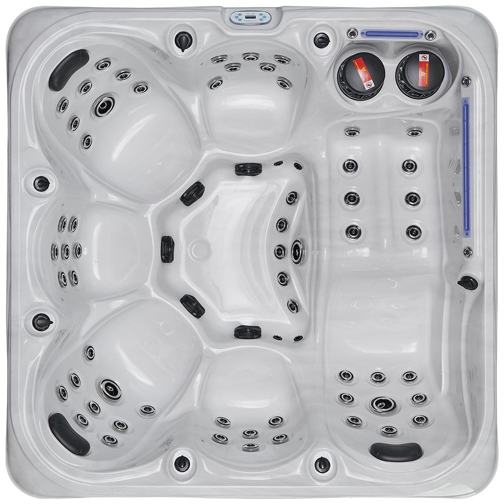 White hot tub with black jets and control panels.