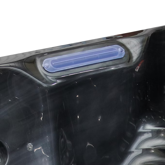 Blue plastic handle on black hot tub