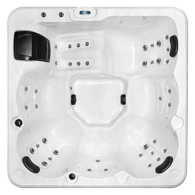 White hot tub with black accent panels and multiple jet nozzles.