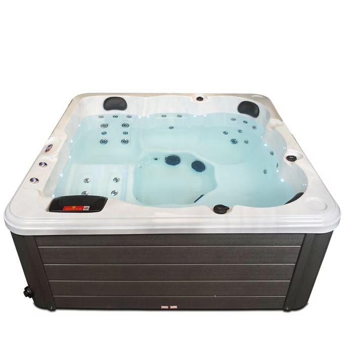 White and dark gray hot tub with multiple jet nozzles, black control panel, and a sleek modern design.