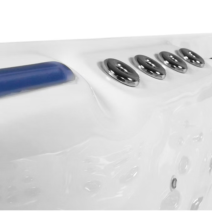 White hot tub with chrome control buttons and a blue handle.