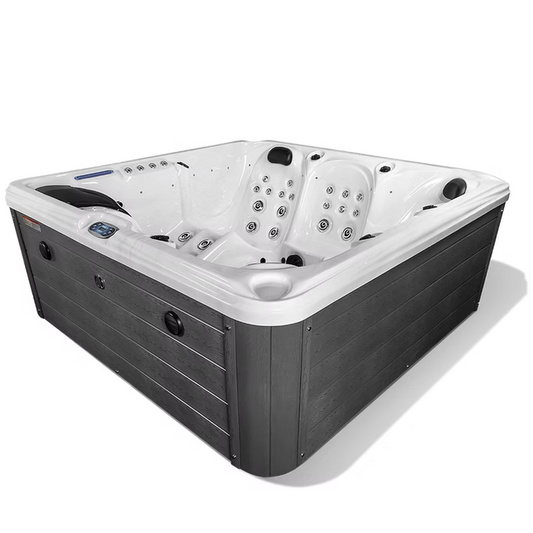 White and dark gray hot tub with built-in massage jets and a sleek, modern design.
