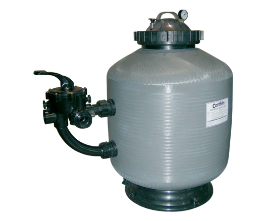 Gray plastic swimming pool filter with black metal fittings and a pressure gauge on top