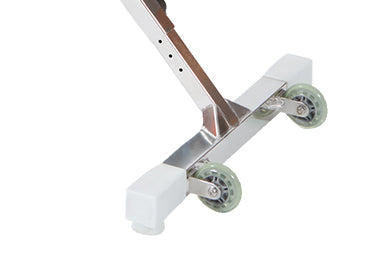 Silver metal exercise bench with white plastic casters and a sturdy, adjustable frame.