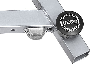 Silver metal trailer hitch with black adjustment knob labeled ’to adjust loosen then pull’.