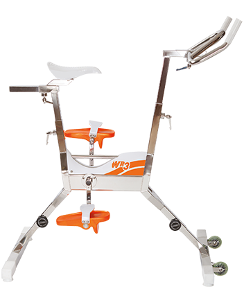 White and orange wri brand stationary bike with metallic frame.